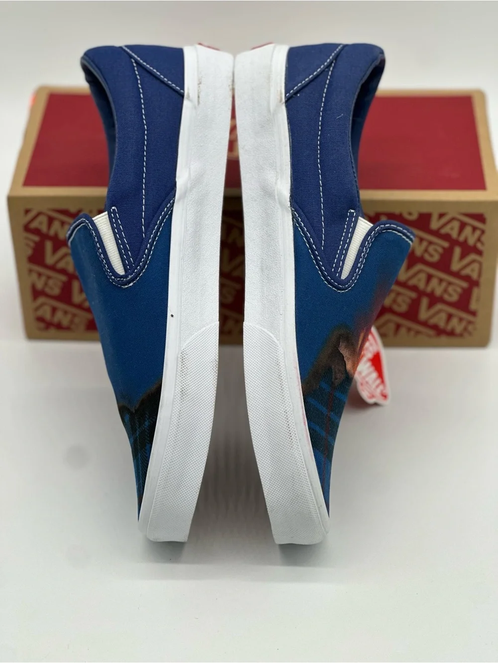 Vans Blue Plaid Slip-On Sneakers with Orange Accent